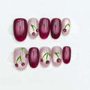 Handmade nails with cherry design on a white background, Obroi
