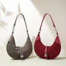 Two handbags, one gray and one red, on a light background, Obroi