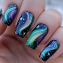 Nails with galaxy design featuring green, purple, and black colors, Obroi