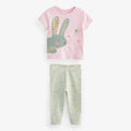Children's outfit with pink shirt and floral pants on a white background, Obroi