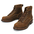 Pair of brown leather boots on a white background with a brand logo in the corner, Obroi