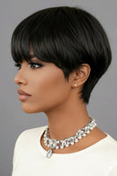 Woman with a stylish haircut and jewelry against a gray background, Obroi