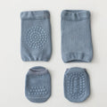 Set of blue baby socks with textured sole on a light gray background, Obroi