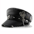 Black leather cap with skull and skeleton hand design on a white background, Obroi