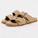 Beige sandals with double straps on a white background, Obroi
