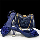 Elegant Green Handbag & Medium Heel Shoe Set with Exquisite Handmade Floral Accents