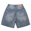 Back view of blue denim shorts on a white background, Obroi