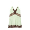 Light green dress with brown lace details on a white background, Obroi