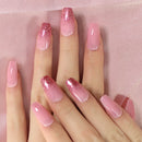 Close-up of hands with pink and glittery nails on a pink fabric background, Obroi