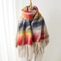 Colorful plaid scarf with fringe on a wooden hanger against a white background, Obroi