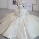 White lace dress on a mannequin against a neutral background, Obroi