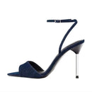 Navy blue high-heeled sandal with thin strap on a white background, Obroi