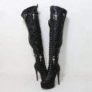 Black high-heeled boots with chain details on a white background, featuring the brand 'Obroi'.