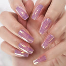 Close-up of hands with lavender-colored nail polish on a light background, Obroi