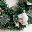 Decorative Christmas wreath with greenery, gold ornaments, and a fabric deer ornament on a white background, Obroi