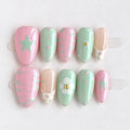 Set of pastel-colored nail art designs on a white background, Obroi