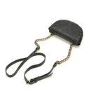 Black studded handbag with a chain strap on a white background, Obroi
