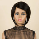 A mannequin head wearing a short dark brown wig with a side part, styled with silver hoop earrings and a black lace mock-neck top against a beige background. The Obroi logo is visible in the top left corner.