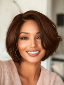 Woman with a stylish bob haircut wearing a beige sweater indoors, Obroi