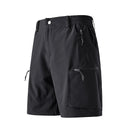 Black shorts with zippers and pockets on a white background, Obroi