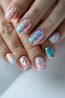 Nails with colorful, iridescent design on a neutral background, Obroi