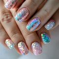 Nails with colorful, iridescent design on a neutral background, Obroi