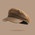 Beige cap on a beige background, Obroi