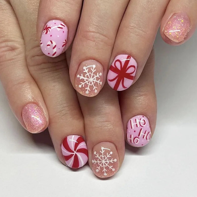 Obroi Nails with Christmas-themed designs on a white background