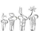 Set of silver rings with intricate designs on a white background, Obroi