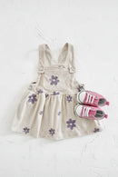 Children's overalls with floral patterns and matching shoes on a light background, Obroi