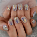 Hand with silver and purple gradient nail polish on a neutral background, Obroi