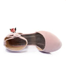 Pink shoe with a bow and flower detail on a white background, Obroi