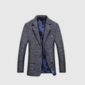 Gray blazer with a textured pattern on a light gray background, Obroi