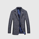 Gray blazer with a textured pattern on a light gray background, Obroi
