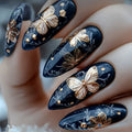 Nails with black and gold butterfly design, Obroi