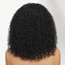 Black curly wig on a neutral background with 'Obroi' branding.