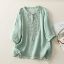 Light green blouse with embroidery on a light background, Obroi
