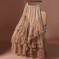 Beige ruffled skirt on a hanger against a brown background, Obroi