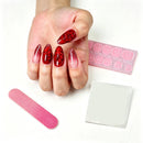 Hand with red nail art, alcohol pad, and nail file on a white background, Obroi
