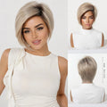 A woman modeling a short layered wig with a side-swept bang and asymmetrical cut, shown in a three-panel collage from front, front-three-quarter, and back views. The wig is light ash blonde with subtle gray tones, Obroi