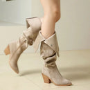 Beige suede knee-high boots with a block heel on a light background, Obroi