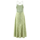 Light green dress with criss-cross straps on a white background, Obroi