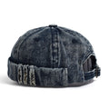 Denim cap with distressed details on a white background, Obroi