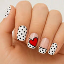 Nails with polka dot and heart design on a white background, Obroi
