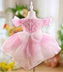 Pink dress on a mannequin with a blurred background, Obroi