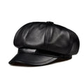 Black leather cap on a white background, Obroi