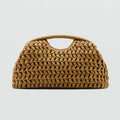 Woven handbag on a light gray background, Obroi