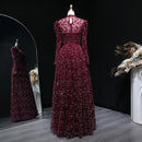 Maroon evening gown on a mannequin with a mirror reflection against a dark background, Obroi