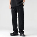 Person wearing black pants and black shoes on a white background, Obroi