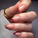 Hand with floral nail design on a neutral background, Obroi